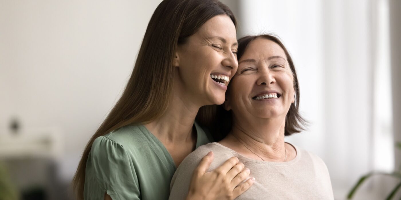 Mother and daughter smiling together, relieved to have decided on an assisted living community in Minnesota.